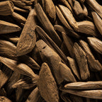 Copeaux de bois de oud, le parfum de la bougie Luminante