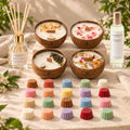 Coffret cadeau Luminante Absolu : un diffuseur d'ambiance et ses bâtonnets, un vaporisateur, quatre bougies parfumées en noix de coco et vingt fondants parfumés
