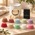 Coffret cadeau Luminante Cocooning : un brûle-parfum en céramique blanche et dorée, un briquet noir et dix fondants parfumés