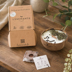 Bougie Luminante Verveine Menthe avec sa boîte kraft, son bloc de terreau et sa carte de plantation